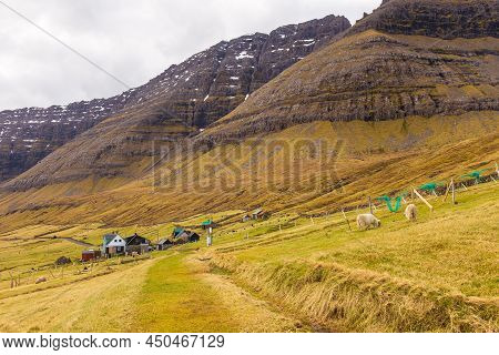 View Of The Muli On Bordoy Island. A Small Village Situated On The Slope Of A Hill. Faroe Islands.