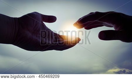 Two Hand Try To Reach Out To Bright Shining Light.