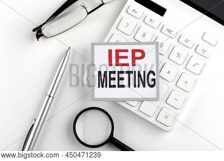 Iep Meeting Text On Sticker With Calculator, Glasses And Magnifier