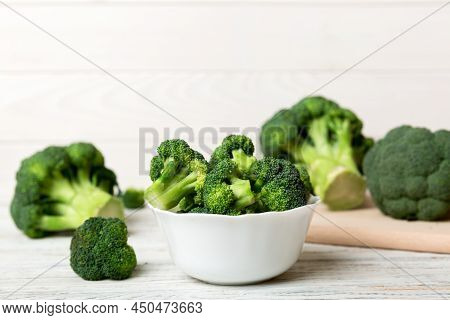 Broccoli Of Fresh Green Broccoli In Bowl Over Coloredbackground. , Close Up. Fresh Vegetable.