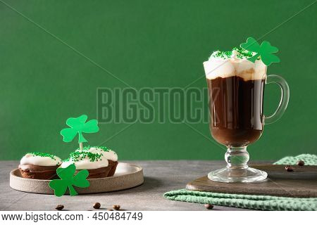 Irish Coffee In Green Cup And Special Cupcakes For St Patrick S Day.