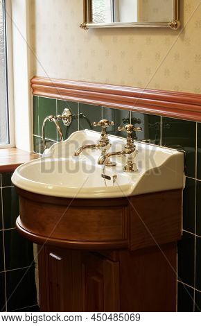 New Luxury Hotel Vintage Brass Gold Plated Pillar Taps In Ensuite Bathroom At Wash Basin