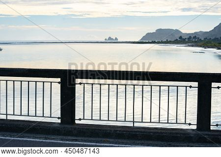 Bridge Railing With View Along Uawa River To Coast In Background, Tolaga Bay New Zealand.