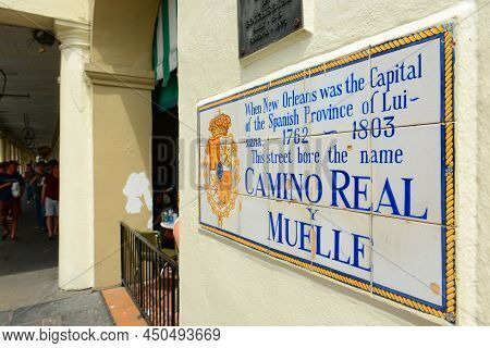 New Orleans - May. 29, 2017: Decatur Street Sign With Historic Road Name As Camino Real Y Muelle In 