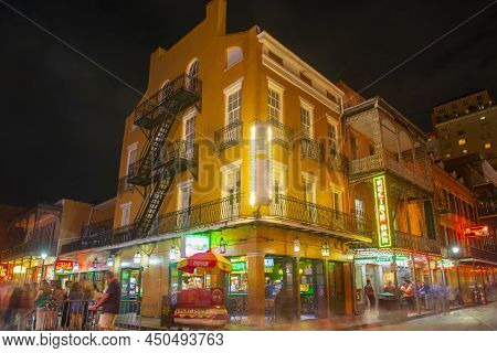 New Orleans - Jun. 1, 2017: Historic Commercial Buildings At Night On 200 Bourbon Street At Ibervill