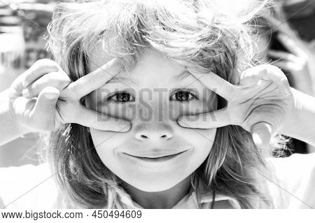 Kids Funny Face. Close Up Portrait Of Fyn Child Making Funny Expressions.