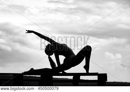 Fit Sporty Girl Doing Backbend Exercise. Full Length. Woman Gymnastic Silhouette. Urban Style, Full 