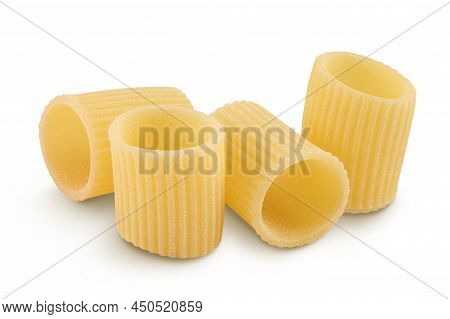 Raw Italian Pasta Isolated On White Background With Clipping Path . Mezze Maniche Rigate Bronze Die