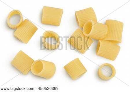 Raw Italian Pasta Isolated On White Background With Clipping Path . Mezze Maniche Rigate Bronze Die.