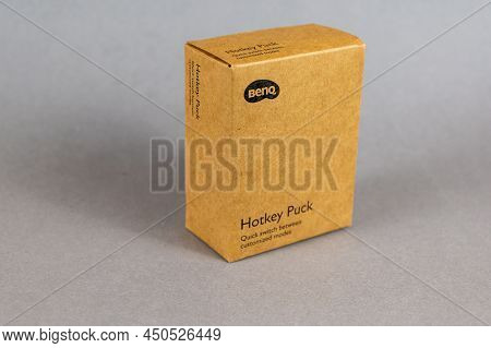 Brown Cardboard Box With Hotkey Puck For Benq Monitor On A Gray Background. Ukraine, Nikolaev - 02 0