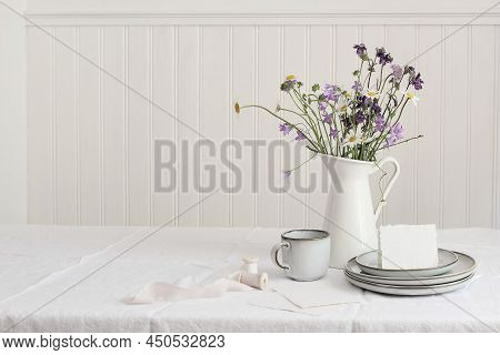 Spring, Summer Breakfast Still Life. Jug With Wild Flowers Bouquet On Linen Table Cloth. Daisies, Bl