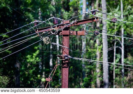 View Of Electric Wires In A Pole Supplying Electricity To Rural Area