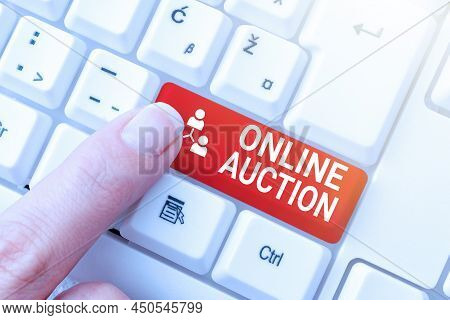 Text Sign Showing Online Auction. Internet Concept Digitized Sale Event Which Item Is Sold To The Hi