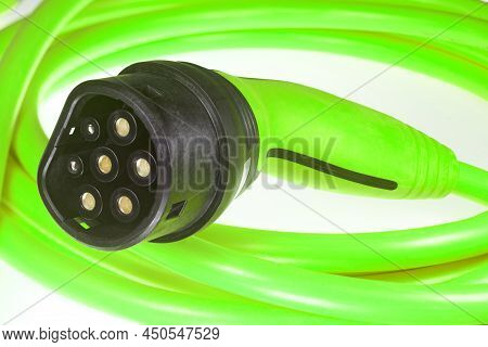 A Colored Charging Cable For Electric Cars Against A White Background.