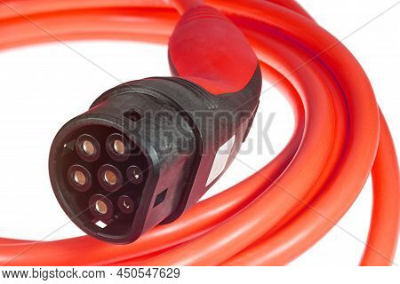 A Colored Charging Cable For Electric Cars Against A White Background.