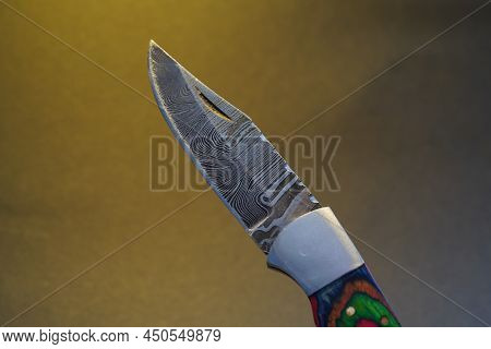 Damask Hand-forged Knife Made Of Several Layers Of Steel With An Exclusive Pattern Photographed In T