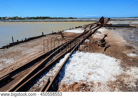 Manufactory Food Like Cristal Spice Salt In Caribbean Island Dominican Republic. Old Rails Serve For