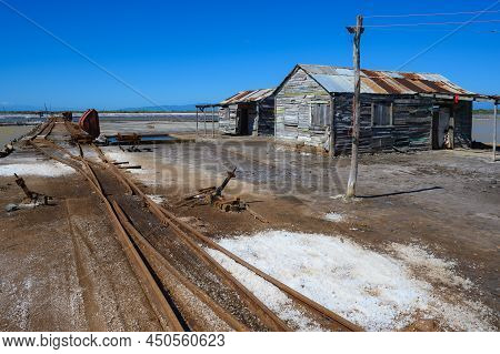 Manufactory Food Like Aquatic Spice In Caribbean Island Dominican Republic. Old Rails Serve For Tran