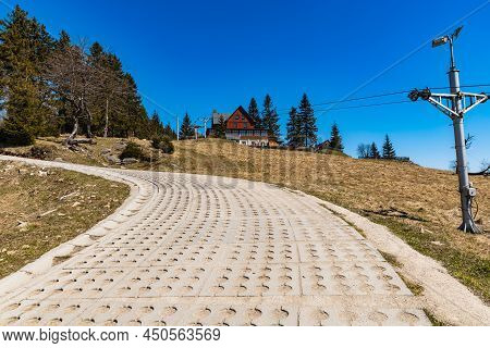 Owl Mountains, Poland - April 2021: Long Mountain Trail To Orzel Mountain Shelter In Owl Mountains