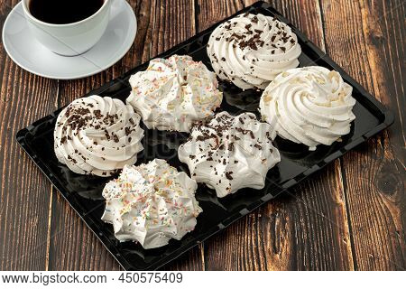 Meringue Cookies Or Beze Cookies With Candy And Chocolate