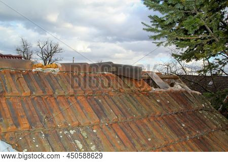 Close-up Of Roof Damage After A Strong Storm.