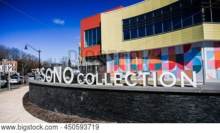 NORWALK, CT, USA - MARCH 3 2022: West Avenue view  with The SONO collection shopping mall sign  in nice sunny day