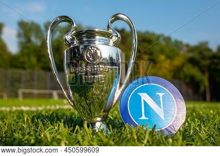 August 30, 2021, Naples, Italy. S.s.c. Football Club Emblem Napoli And The Uefa Champions League Cup