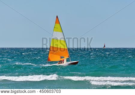 Colorful Sailboat Sailing On A Windy Sunny Summer Day On Georgian Bay