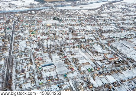 Drone View Of A Small Village In Winter, A Small House In The Snow, Aerial View
