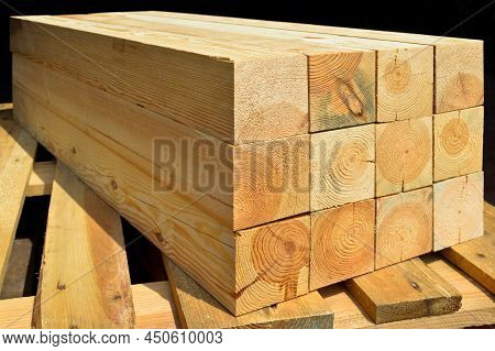 Pine Lumber Stacked In A Row At The Sawmill, Lumber Stack For Storage Construction Or Industrial Wor