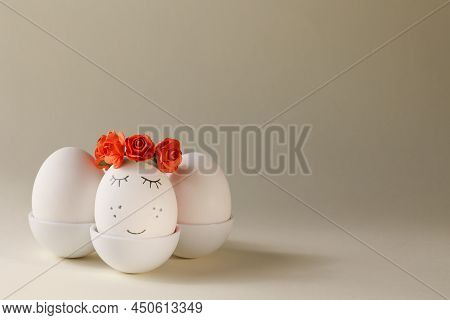 Three White Easter Eggs In An Egg Stand