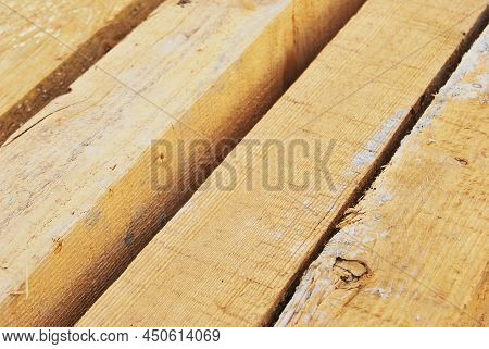 Pine Lumber Stacked In A Row At The Sawmill, Lumber Stack For Storage Construction Or Industrial Wor