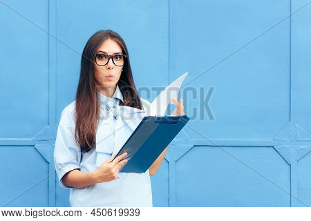 Woman Holding A Clipboard Having Questions Conducting A Survey