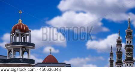 Ramadan, Eid Ai-fitr,new Year Muharram Islamic Religion Symbols With Mosques Dome On Blue Sky In Day
