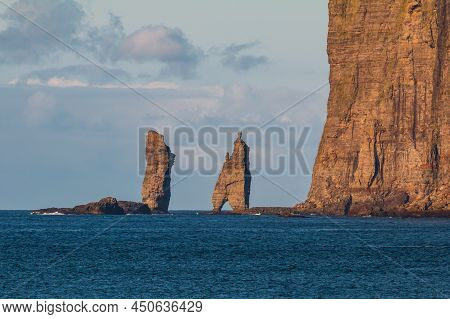Risin Og Kellingin Rock Formations On The Coast Of Streymoy Island. Coastline Cliffs Landscape. Tjor
