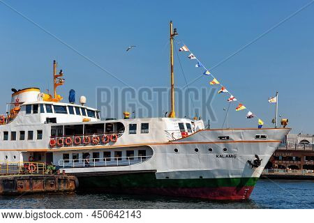 Istanbul, Turkey - July 05, 2018: Small Cruise Ship Kalamis Moored In Eminonu Pier In Golden Horn Ba