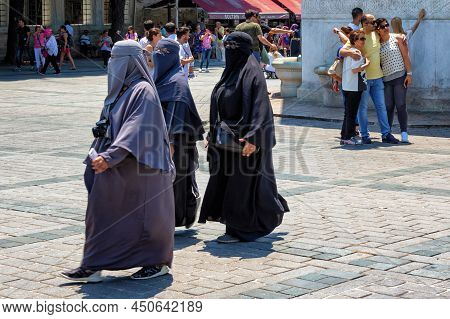 Istanbul, Turkey - July 05, 2018: Unknown Women In Hijab Clothes On One Of The Central Streets Of Is