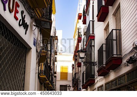 Sevilla, Spain -march 03, 2022 : Typical Street In Santa Cruz Quarter Famous Historical Part Of Sevi