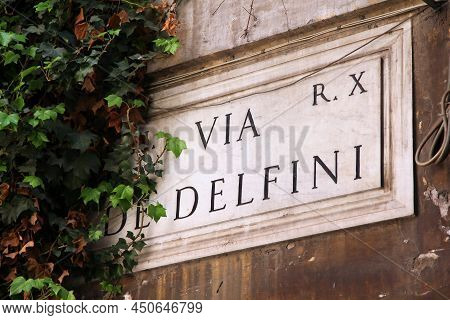 Rome Detail. Via De Delfini - Old Street Name Sign In Rome, Italy. Campitelli District (rione Campit