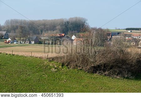 Merchtem, Flemish Brabant Region, Belgium - 03 06 2022: View Over The Fields And Green Hills At The 