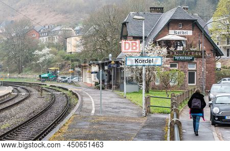 Kordel, Rhineland-palatinate - Germany - 04 09 2019 Young White Woman With Backpack Walking Towards 
