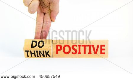 Think And Do Positive Symbol. Businessman Turns Wooden Cubes And Changes Words Think Positive To Do 