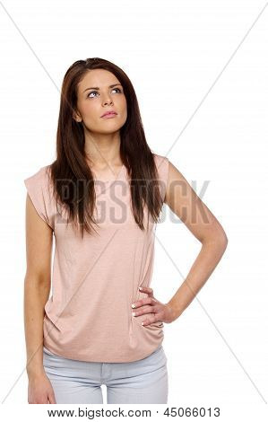 Brunette Woman Looking Up Thinking