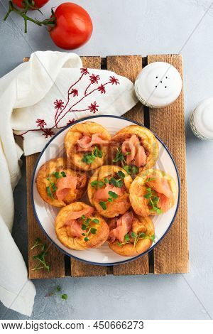 Yorkshire Pudding. Traditional English Yorkshire Pudding With Salmon And Radish Microgreens Side Dis