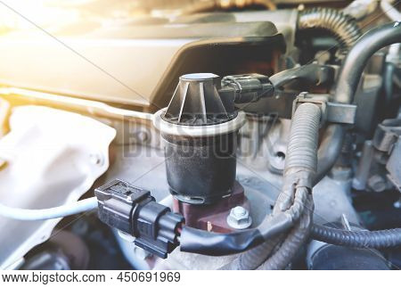 Close Up Of The Old Exhaust Gas Recirculation (egr) In The Car Engine Compartment To Reduce The Carb