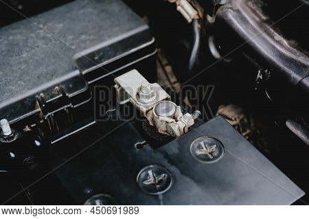 Battery Cathode Terminal Is Installed On A Black Battery In A Electric System Of Car Engine, Automot
