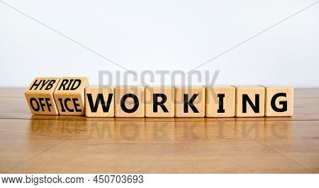 Hybrid Or Office Working Symbol. Turned Wooden Cubes And Changed Words Office Working To Hybrid Work
