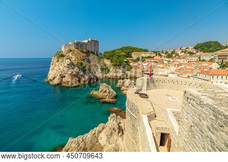 Aerial View On Top Walls Of Dubrovnik City Of Croatia. Looking Fort Lovrijenac Fortress, Over The We