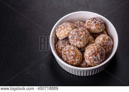 Tasty Homemade Gingerbread Cookies On Dark Concrete Table