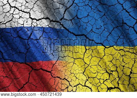 Ukrainian And Russian Flags, Ukraine Crisis And Conflict.choose To Focus On The Flags, International